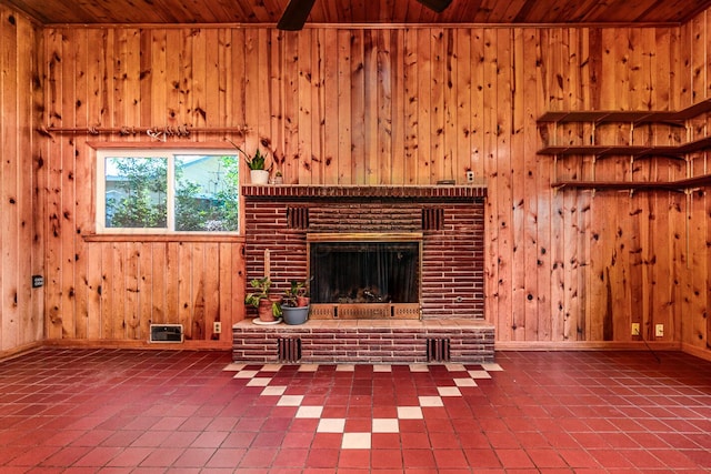 unfurnished living room with a brick fireplace, wooden walls, and wood ceiling