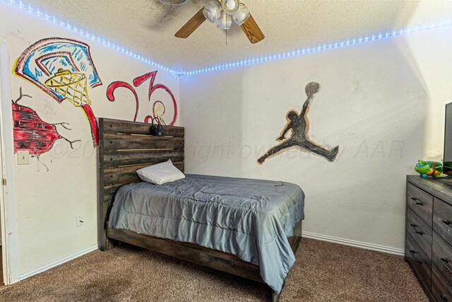 5216 Westway Trl, Amarillo, TX 79109 - carpeted bedroom with a ceiling fan and a textured ceiling