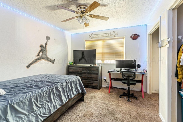 5216 Westway Trl, Amarillo, TX 79109 - bedroom featuring a textured ceiling, carpet floors, an office area, and ceiling fan
