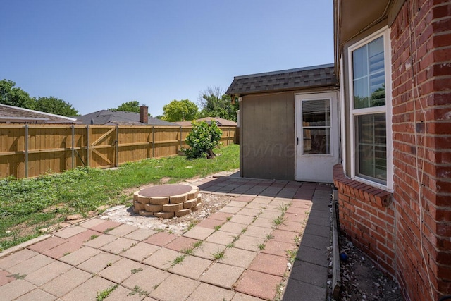 5216 Westway Trl, Amarillo, TX 79109 - fenced backyard with an outdoor fire pit and a patio