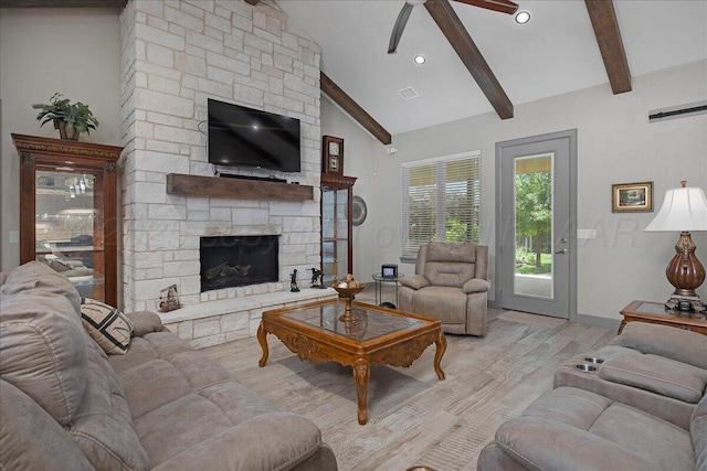 8205 S Liberty Cir, Amarillo, TX 79119 - living area with ceiling fan, light wood-style floors, a stone fireplace, and recessed lighting