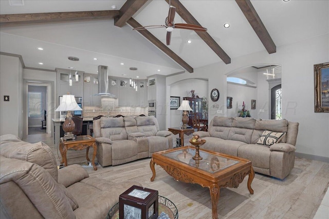 8205 S Liberty Cir, Amarillo, TX 79119 - living room featuring ceiling fan, recessed lighting, arched walkways, and light wood finished floors