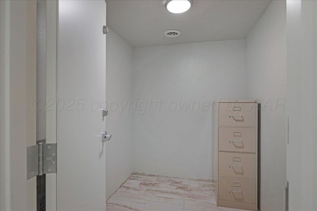 8205 S Liberty Cir, Amarillo, TX 79119 - laundry area with light wood-style floors