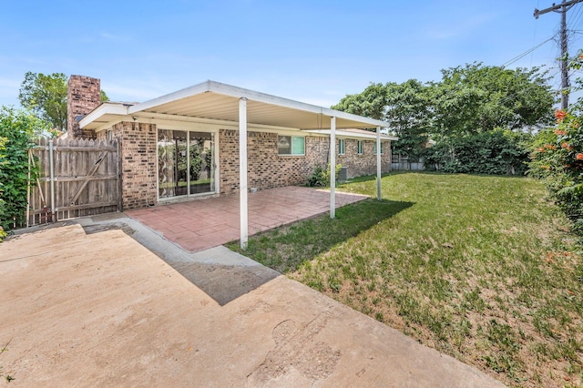 4720 Cherokee Trl, Amarillo, TX 79109 - view of yard featuring a patio and a gate