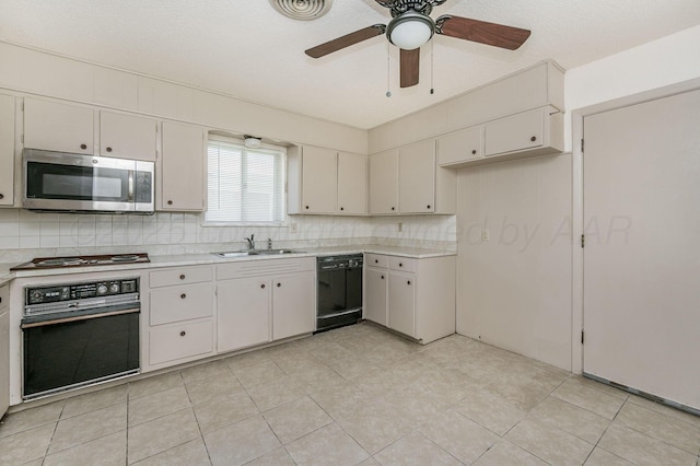 4720 Cherokee Trl, Amarillo, TX 79109 - kitchen with black appliances, light countertops, ceiling fan, tasteful backsplash, and light tile patterned floors