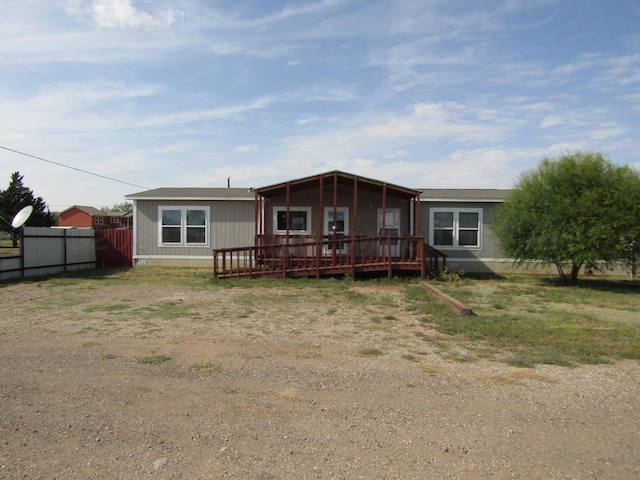 view of front of house with a wooden deck