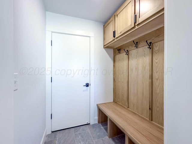 mudroom featuring baseboards