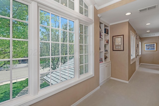 3506 Van Winkle Dr, Amarillo, TX 79121 - doorway to outside with light carpet, baseboards, visible vents, recessed lighting, and crown molding