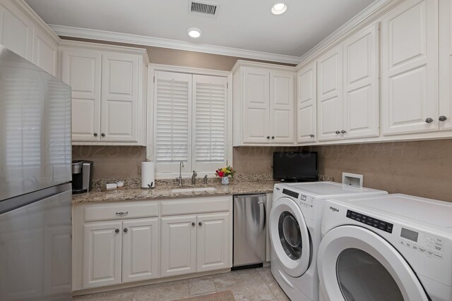 3506 Van Winkle Dr, Amarillo, TX 79121 - clothes washing area featuring recessed lighting, visible vents, ornamental molding, a sink, and washing machine and clothes dryer