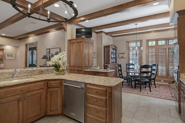 3506 Van Winkle Dr, Amarillo, TX 79121 - kitchen featuring brown cabinetry, a sink, beam ceiling, and a chandelier