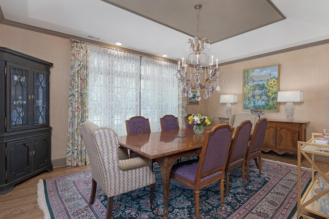 3506 Van Winkle Dr, Amarillo, TX 79121 - dining room with an inviting chandelier, visible vents, and light wood-style flooring