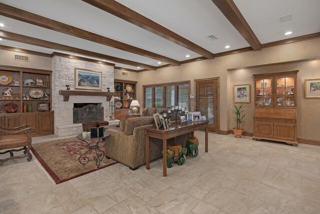 3506 Van Winkle Dr, Amarillo, TX 79121 - living area featuring a stone fireplace, baseboards, beam ceiling, and visible vents