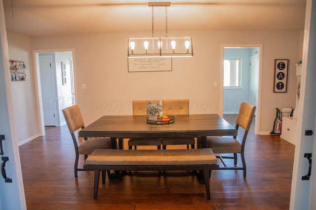 1418 Oak Ave, Panhandle, TX 79068 - dining room featuring dark wood finished floors