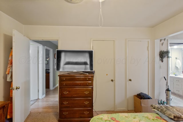 bedroom featuring two closets