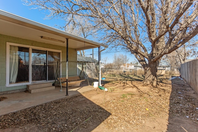 view of yard with a fenced backyard and a patio