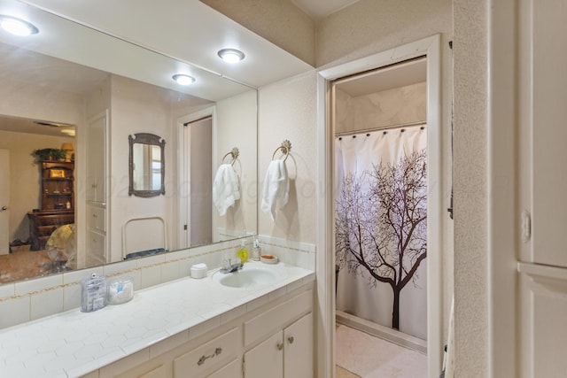 full bathroom featuring vanity