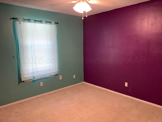 6812 Blacksmith Ln, Amarillo, TX 79109 - carpeted empty room with a ceiling fan and a textured ceiling