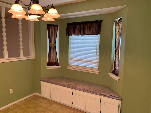 6812 Blacksmith Ln, Amarillo, TX 79109 - unfurnished room featuring baseboards and a chandelier