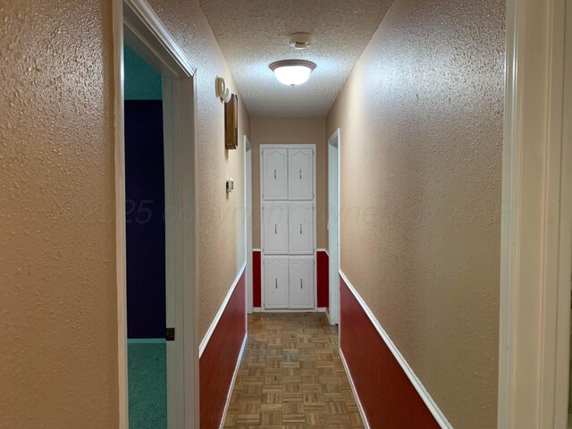 6812 Blacksmith Ln, Amarillo, TX 79109 - hall with a textured wall and a textured ceiling