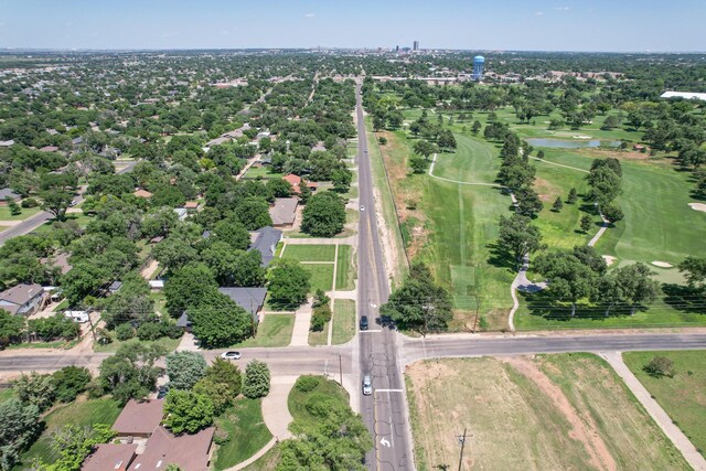 4512 Gem Lake Rd, Amarillo, TX 79106 - view of property location with a nearby body of water and a tree filled landscape