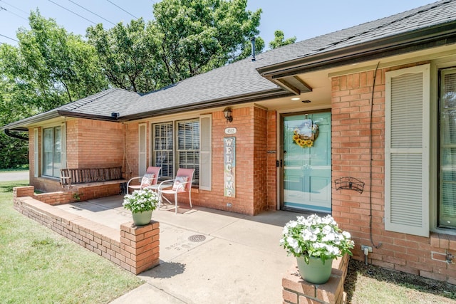 4512 Gem Lake Rd, Amarillo, TX 79106 - entrance to property featuring brick siding and a shingled roof