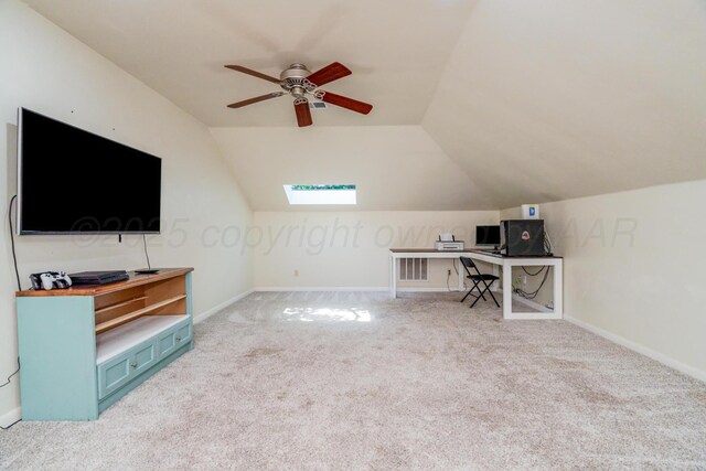 4512 Gem Lake Rd, Amarillo, TX 79106 - unfurnished office featuring carpet, ceiling fan, vaulted ceiling, and a skylight