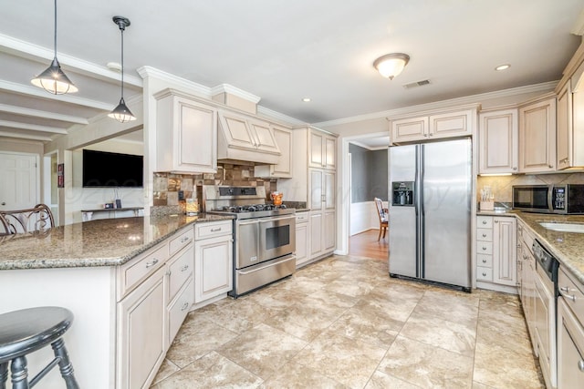 4512 Gem Lake Rd, Amarillo, TX 79106 - kitchen with stainless steel appliances, tasteful backsplash, light stone counters, ornamental molding, and recessed lighting