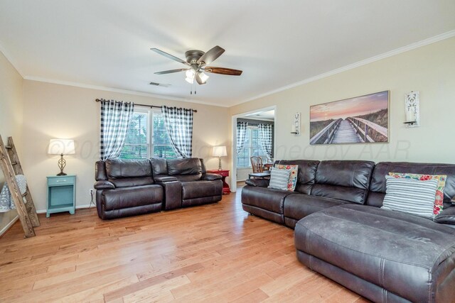 4512 Gem Lake Rd, Amarillo, TX 79106 - living room featuring ceiling fan, light wood-style flooring, and ornamental molding