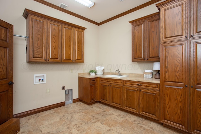 4602 Cape Verde Ct, Amarillo, TX 79119 - laundry area with cabinet space, washer hookup, electric dryer hookup, and ornamental molding