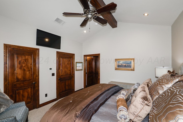 bedroom featuring lofted ceiling with beams, light colored carpet, and ceiling fan