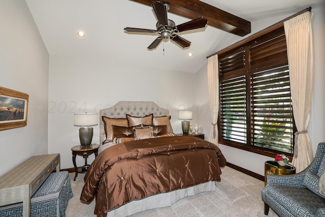 bedroom with ceiling fan, lofted ceiling with beams, and light carpet