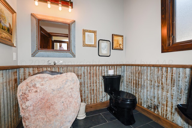 interior space with dark tile patterned flooring