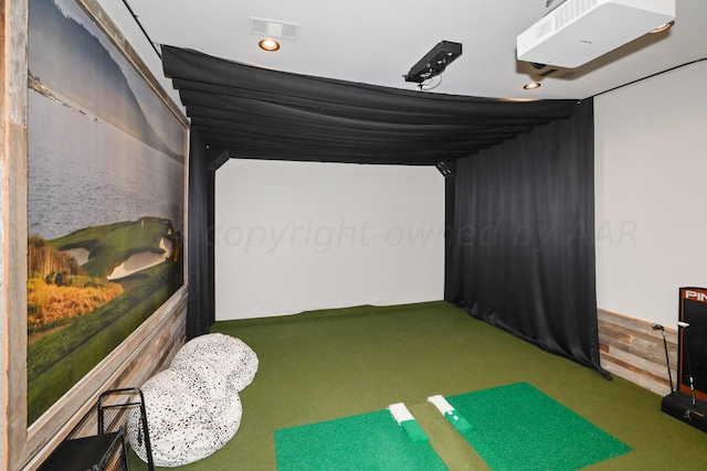 recreation room featuring golf simulator and carpet flooring