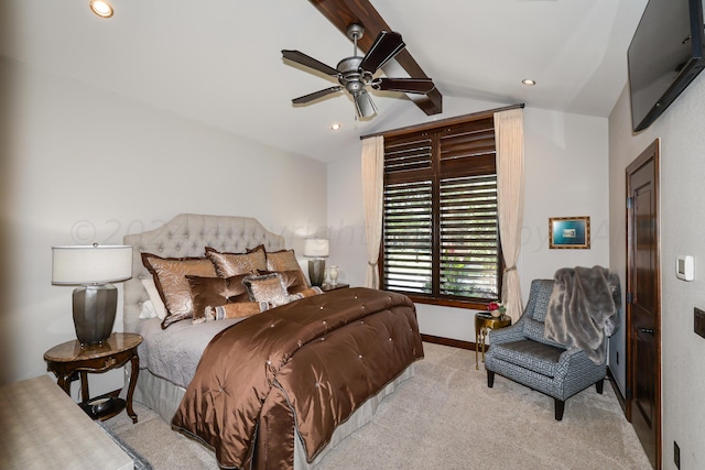 carpeted bedroom with lofted ceiling with beams and ceiling fan