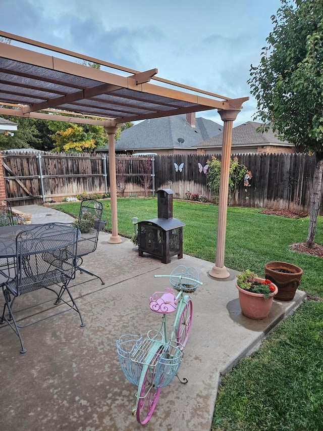 7205 Columbia Ln, Amarillo, TX 79109 - fenced backyard with a pergola, a patio area, and outdoor dining space