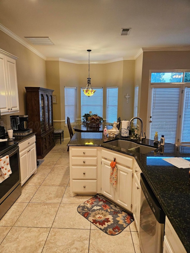 7205 Columbia Ln, Amarillo, TX 79109 - kitchen featuring stainless steel appliances, light tile patterned floors, white cabinetry, crown molding, and pendant lighting