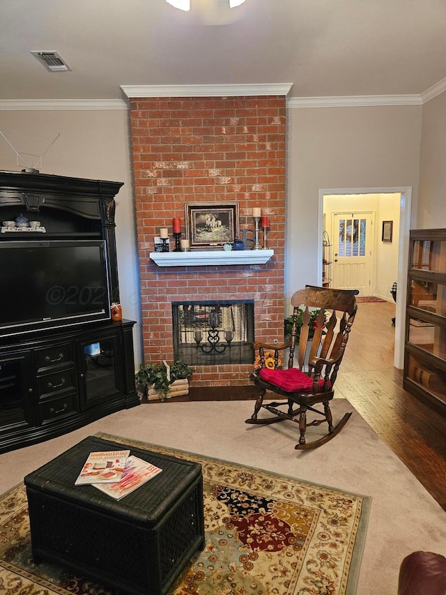 7205 Columbia Ln, Amarillo, TX 79109 - living area with crown molding, a fireplace, and wood finished floors