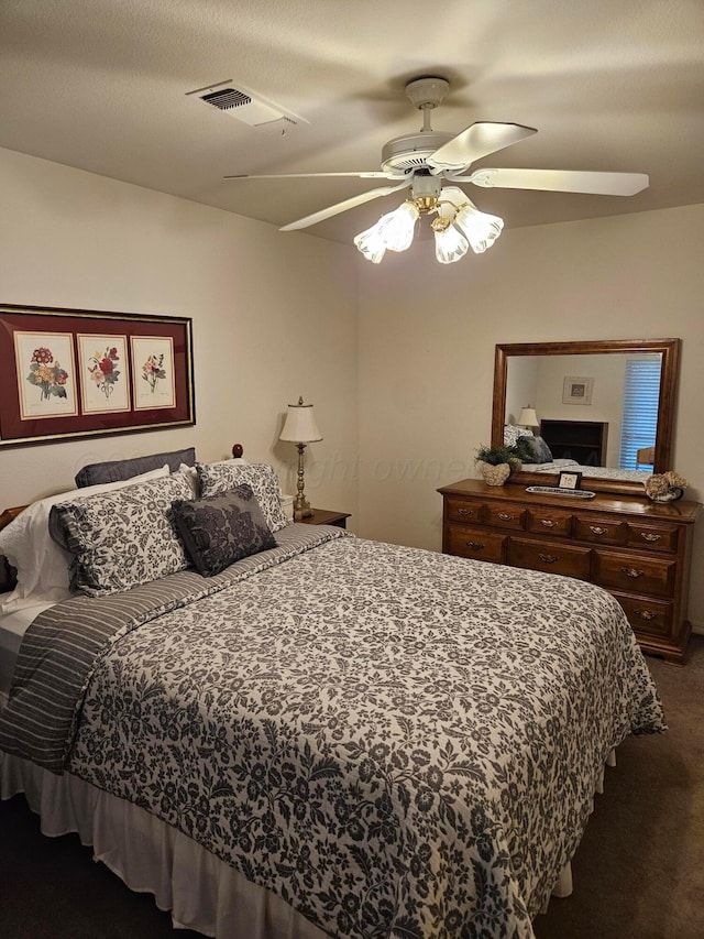 7205 Columbia Ln, Amarillo, TX 79109 - bedroom with carpet floors and a ceiling fan