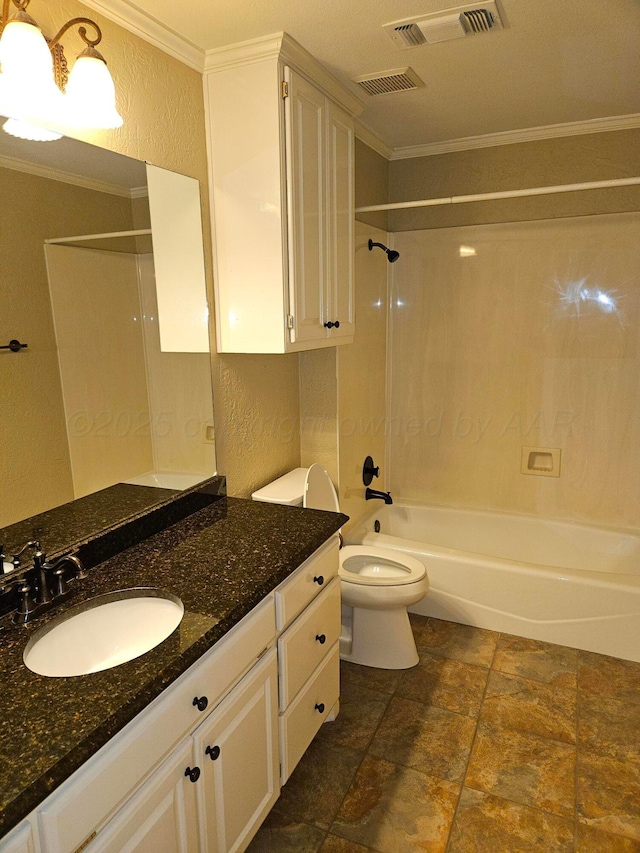 7205 Columbia Ln, Amarillo, TX 79109 - full bath featuring crown molding, shower / tub combination, vanity, a textured wall, and stone finish flooring