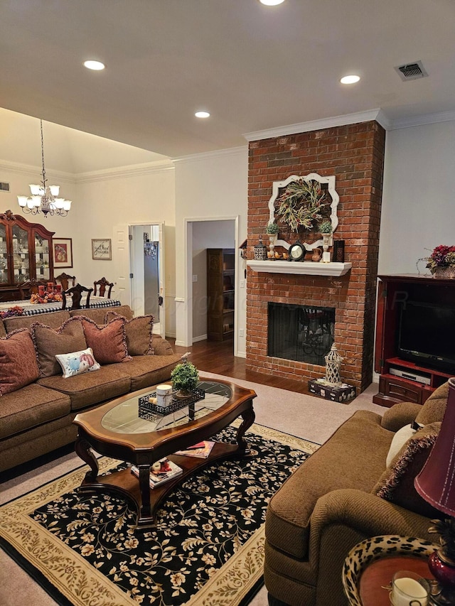 7205 Columbia Ln, Amarillo, TX 79109 - living area with ornamental molding, a brick fireplace, a chandelier, and recessed lighting