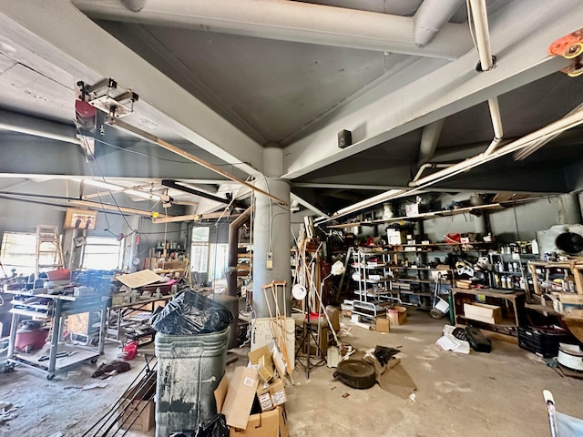 interior space with concrete floors and a workshop area