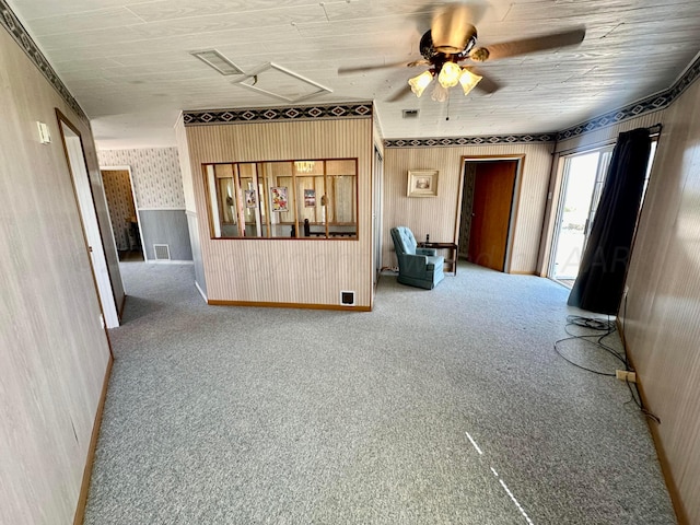 hallway with carpet floors