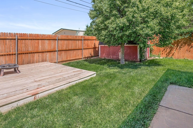 view of yard with a deck