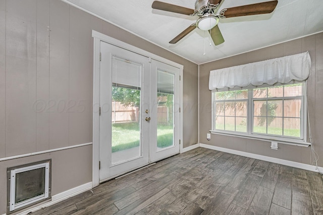 doorway with french doors, wood finished floors, baseboards, and ceiling fan