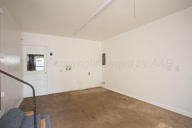 4405 S Ong St, Amarillo, TX 79110 - empty room featuring unfinished concrete flooring and electric panel
