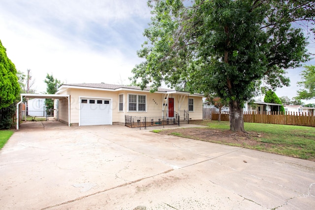 4405 S Ong St, Amarillo, TX 79110 - ranch-style home with an attached garage, concrete driveway, and a carport