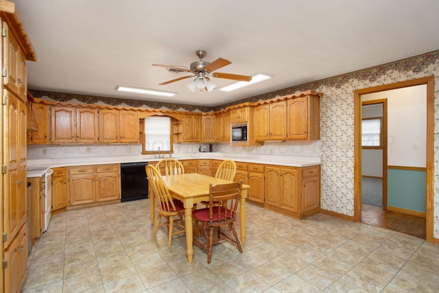 4405 S Ong St, Amarillo, TX 79110 - kitchen featuring black appliances, light countertops, ceiling fan, and brown cabinetry