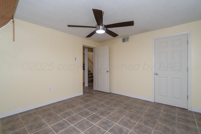 empty room with ceiling fan