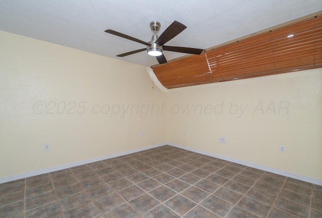 unfurnished room featuring wood ceiling and ceiling fan