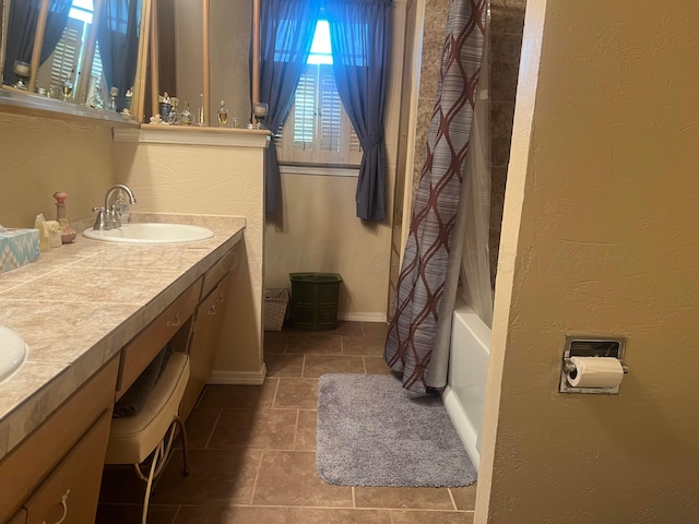 bathroom featuring vanity and shower / tub combo